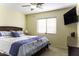 Cozy bedroom features a comfortable bed and neutral decor, creating a serene retreat at 1325 E Brent Ct, Casa Grande, AZ 85122