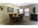 Well-lit dining room featuring a chandelier, side bar, and comfortable seating at 1325 E Brent Ct, Casa Grande, AZ 85122