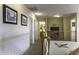 Upstairs hallway leading to bedrooms and bathrooms with wood banister at 1325 E Brent Ct, Casa Grande, AZ 85122
