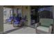 Cozy covered patio featuring comfortable seating, perfect for relaxing or entertaining outdoors at 1325 E Brent Ct, Casa Grande, AZ 85122