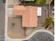 Overhead shot displays terracotta roof tiles, desert landscaping and a covered patio at 15018 S 28Th St, Phoenix, AZ 85048