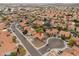 An aerial view of the community showcases terracotta roofs and desert landscaping at 15018 S 28Th St, Phoenix, AZ 85048