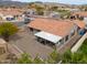 Aerial view of the backyard with a covered patio and desert landscaping at 15018 S 28Th St, Phoenix, AZ 85048