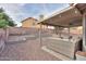 Enjoy the covered patio and gravel landscaping in the spacious and private backyard at 15018 S 28Th St, Phoenix, AZ 85048