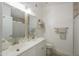 Bright bathroom featuring a double vanity, modern fixtures, and a well-lit mirror setup at 15018 S 28Th St, Phoenix, AZ 85048