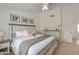 Well-lit bedroom with an elegant bed, complemented by neutral colors and stylish furniture at 15018 S 28Th St, Phoenix, AZ 85048