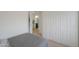 Bedroom with a closet, access to the ensuite bath, and neutral carpet at 15018 S 28Th St, Phoenix, AZ 85048