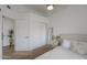 Bedroom with neutral decor, closet with sliding doors, and lots of natural light at 15018 S 28Th St, Phoenix, AZ 85048