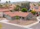 Charming single-story home with desert landscaping, tile roof, and a two-car garage at 15018 S 28Th St, Phoenix, AZ 85048