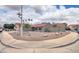 Corner lot home with desert landscaping, a tile roof, and a two-car garage at 15018 S 28Th St, Phoenix, AZ 85048