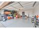 Spacious garage with epoxy flooring, plenty of storage, and room for multiple bikes at 15018 S 28Th St, Phoenix, AZ 85048