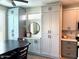 Dining area showcasing floor-to-ceiling cabinets in muted gray tones with dark hardware at 16415 W Lava Dr, Surprise, AZ 85374