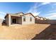 A spacious backyard offers plenty of room for outdoor enjoyment with a blank slate at 17057 W Seldon Ln, Waddell, AZ 85355
