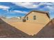 The property features a spacious backyard with block wall fencing offering privacy at 17081 W Seldon Ln, Waddell, AZ 85355