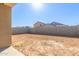 An open backyard offers endless possibilities for creating an outdoor oasis at 17081 W Seldon Ln, Waddell, AZ 85355