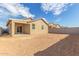 Property boasts a big backyard with ample space and a block wall for seclusion at 17081 W Seldon Ln, Waddell, AZ 85355
