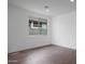 Bedroom featuring neutral walls, recessed lighting, and wood-look tile flooring at 17322 W Via Dona Rd, Surprise, AZ 85387