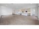 Spacious, open floor plan perfect for entertaining featuring a large living area and eat-in kitchen at 17322 W Via Dona Rd, Surprise, AZ 85387