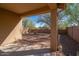 View of the spacious backyard with gravel landscaping and privacy walls at 1821 W Morse Dr, Anthem, AZ 85086