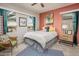 Bright bedroom with natural light, a ceiling fan, and carpet flooring at 20623 N Enchantment Pass, Maricopa, AZ 85138