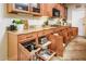 Well-organized kitchen with granite countertops, pull-out drawers, and ample storage at 20623 N Enchantment Pass, Maricopa, AZ 85138