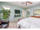 Comfortable bedroom with carpeted floors, natural lighting and serene color scheme at 20623 N Enchantment Pass, Maricopa, AZ 85138