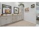 Modern bathroom with double sinks, granite countertops and contemporary fixtures at 2113 W Samantha Way, Phoenix, AZ 85041