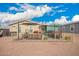 Expansive backyard featuring several seating areas, perfect for outdoor entertaining and relaxation at 2206 S Ellsworth Rd # 149B, Mesa, AZ 85209