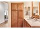 Bright bathroom featuring an abundance of storage, a spacious countertop, and contemporary fixtures at 2206 S Ellsworth Rd # 149B, Mesa, AZ 85209