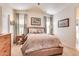 Serene bedroom with neutral tones, soft lighting, and comfortable furnishings at 2206 S Ellsworth Rd # 149B, Mesa, AZ 85209