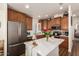 Spacious kitchen featuring stainless steel appliances, ample cabinets, and a center island at 2206 S Ellsworth Rd # 149B, Mesa, AZ 85209