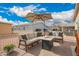 Inviting outdoor seating area with a fire table, perfect for relaxing and socializing at 2206 S Ellsworth Rd # 149B, Mesa, AZ 85209