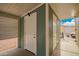 Enclosed patio featuring two doorways, and gravel for easy maintenance at 2206 S Ellsworth Rd # 149B, Mesa, AZ 85209