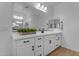 The bathroom features a spacious vanity area with a large mirror and modern lighting at 25582 S 224Th Way, Queen Creek, AZ 85142