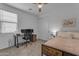 Bedroom features a dedicated workspace, ample natural light, and a relaxing, comfortable ambiance at 25582 S 224Th Way, Queen Creek, AZ 85142