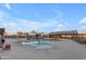 Community pool with lounge chairs, shade covers, and a view of the community at 25582 S 224Th Way, Queen Creek, AZ 85142