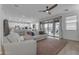 Comfortable living room offers views of the backyard and a relaxed atmosphere at 25582 S 224Th Way, Queen Creek, AZ 85142