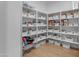 Organized pantry with ample shelving and storage bins for efficient organization at 25582 S 224Th Way, Queen Creek, AZ 85142