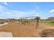 Community playground with swings, woodchips, and nearby walking path at 25582 S 224Th Way, Queen Creek, AZ 85142