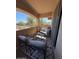 Cozy outdoor balcony furnished with comfortable seating and neighborhood views at 2821 S Skyline Dr # 134, Mesa, AZ 85212