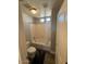 Bright bathroom features a bathtub with shower, toilet, and modern lighting at 2821 S Skyline Dr # 134, Mesa, AZ 85212
