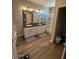 Bathroom featuring double sinks and a glass-enclosed shower at 2821 S Skyline Dr # 134, Mesa, AZ 85212