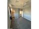 Bedroom features neutral walls, plush carpeting, a ceiling fan, and ample closet space at 2821 S Skyline Dr # 134, Mesa, AZ 85212