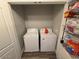 Convenient laundry area features a washer, dryer, and extra storage at 2821 S Skyline Dr # 134, Mesa, AZ 85212