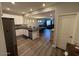 View of kitchen opening up to living and dining areas showcasing the layout at 2821 S Skyline Dr # 134, Mesa, AZ 85212