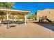 Community park with playground, picnic tables, and barbecue grills at 2821 S Skyline Dr # 134, Mesa, AZ 85212