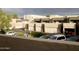 View of the neighborhood featuring multiple garages and parking at 3030 N Hayden Rd # 28, Scottsdale, AZ 85251