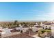 Expansive view from the home showing the neighborhood and distant mountains at 3800 E Lincoln Dr # 7, Phoenix, AZ 85018