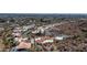 Picturesque aerial view of luxury desert community homes with private pools and beautifully landscaped grounds at 3800 E Lincoln Dr # 7, Phoenix, AZ 85018