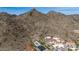 Breath-taking aerial view of desert real estate featuring pools and majestic mountains at 3800 E Lincoln Dr # 7, Phoenix, AZ 85018